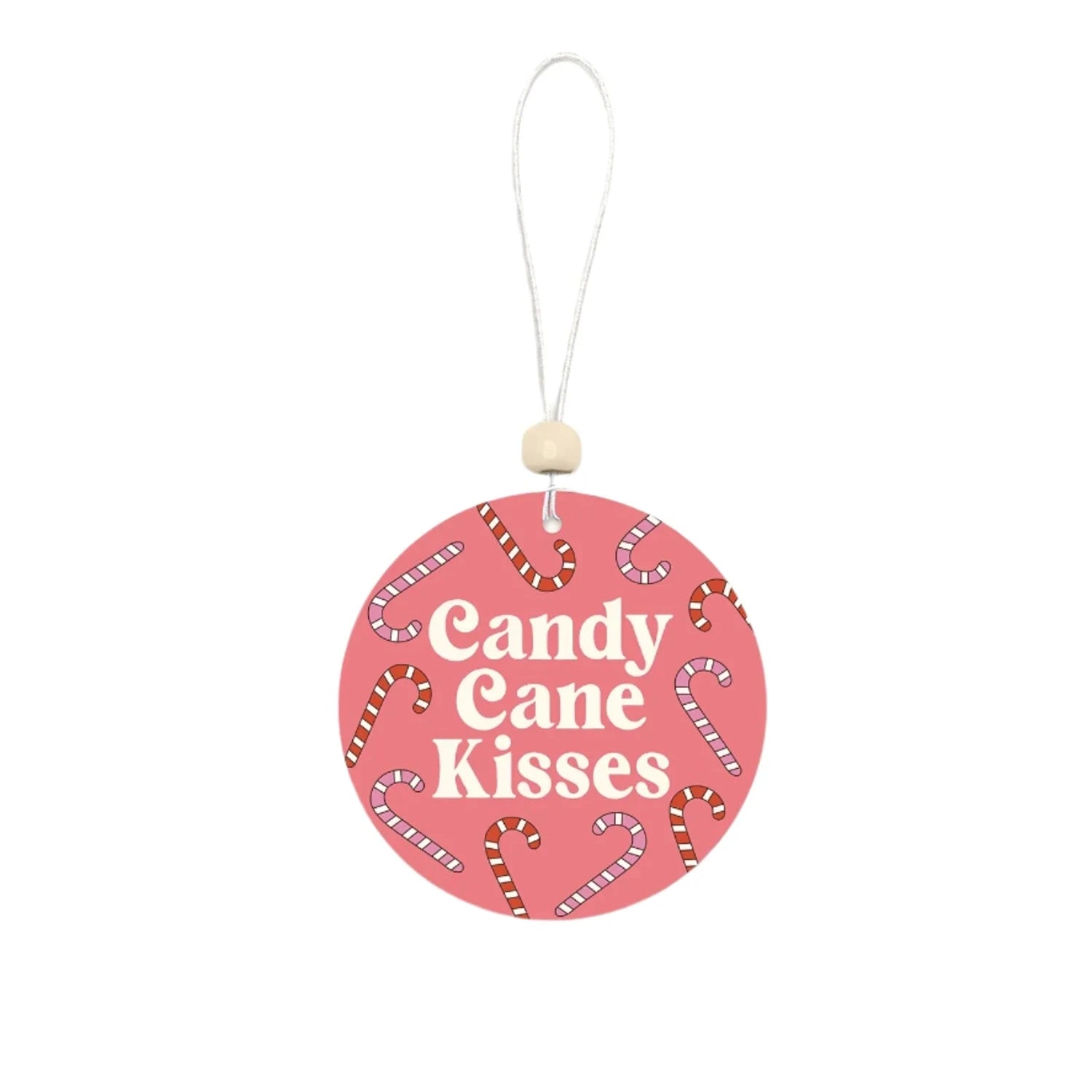 ChatGPT dijo:
Round pink air freshener with “Candy Cane Kisses” text and candy cane illustrations, hanging from a white string with a wooden bead.