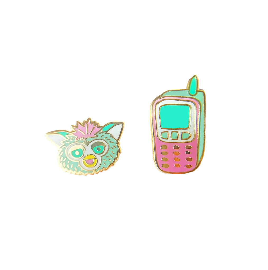 Furby + 90's Cell Earrings, mismatched cloisonné studs gilded in 22k gold with hypoallergenic posts, presented in a glass vial packaging