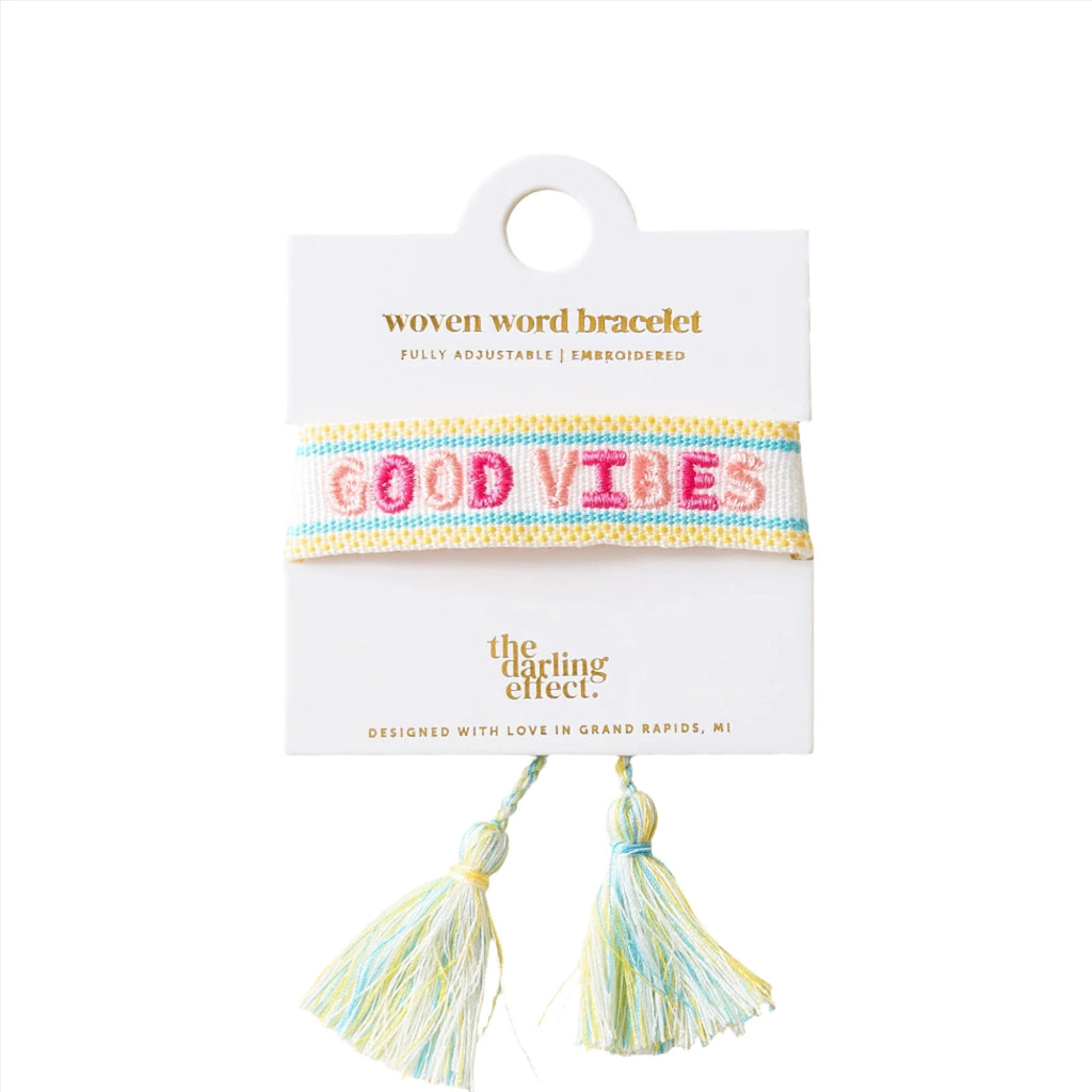 Good Vibes Adjustable Woven Word Bracelet with colorful embroidery and tassel detail