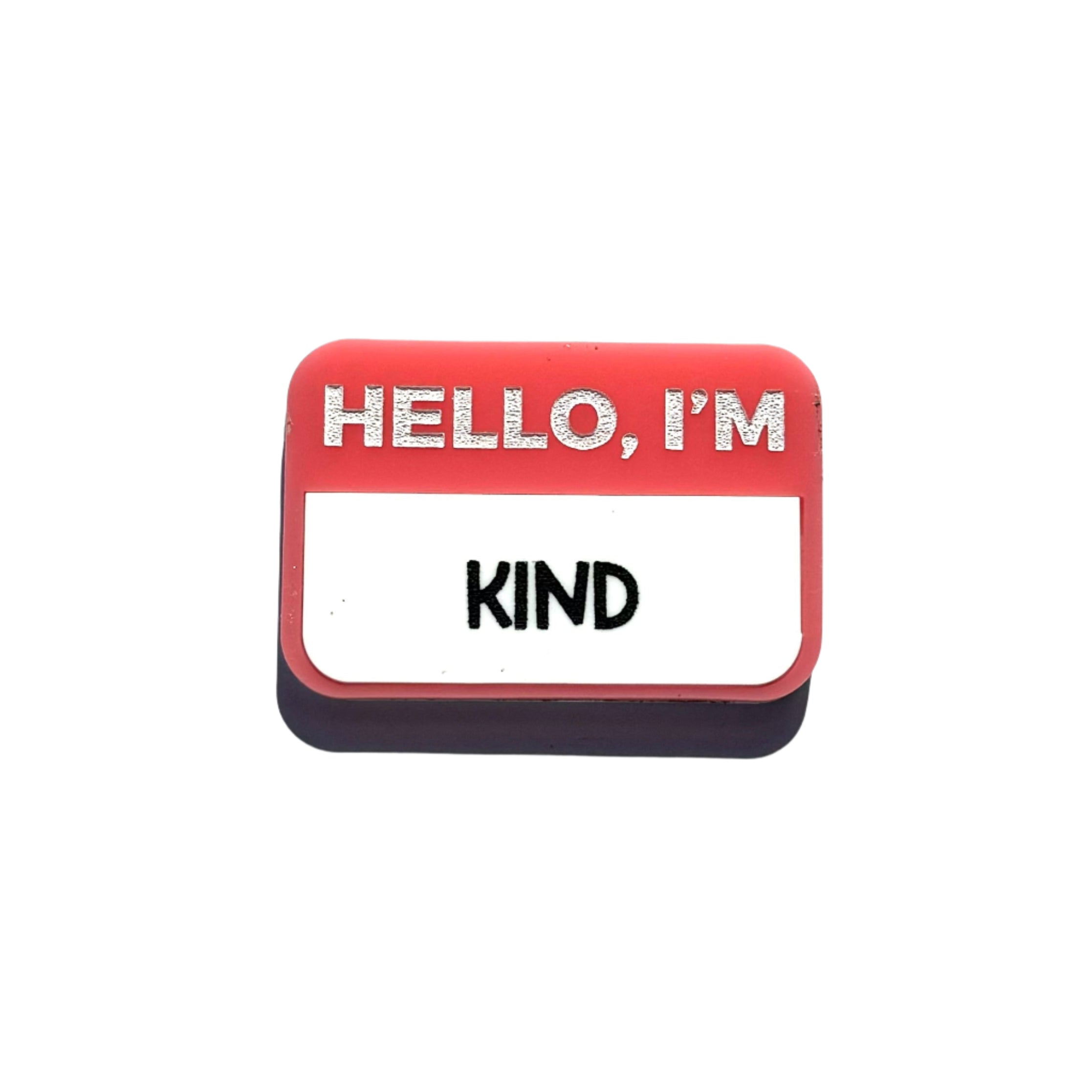 Red name-tag pin that says “HELLO, I’M KIND.”