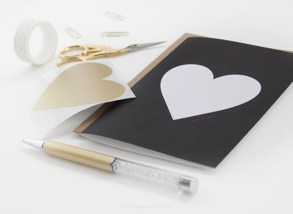 Black greeting card with large gold scratch-off heart – DIY hidden message – Funky Confetti