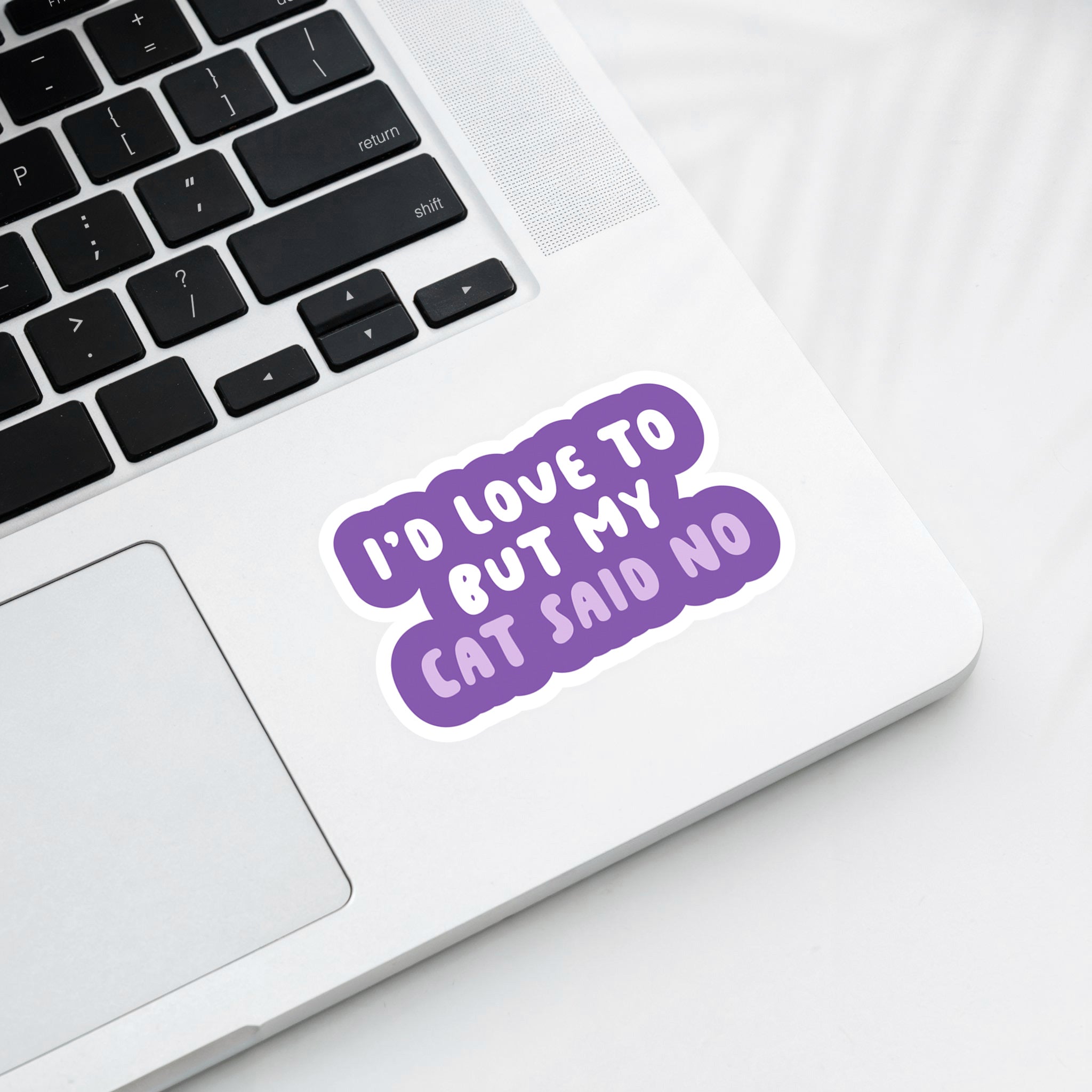 Vinyl sticker with phrase “I’d Love To But My Cat Said No” in bold purple typography – Funky Confetti