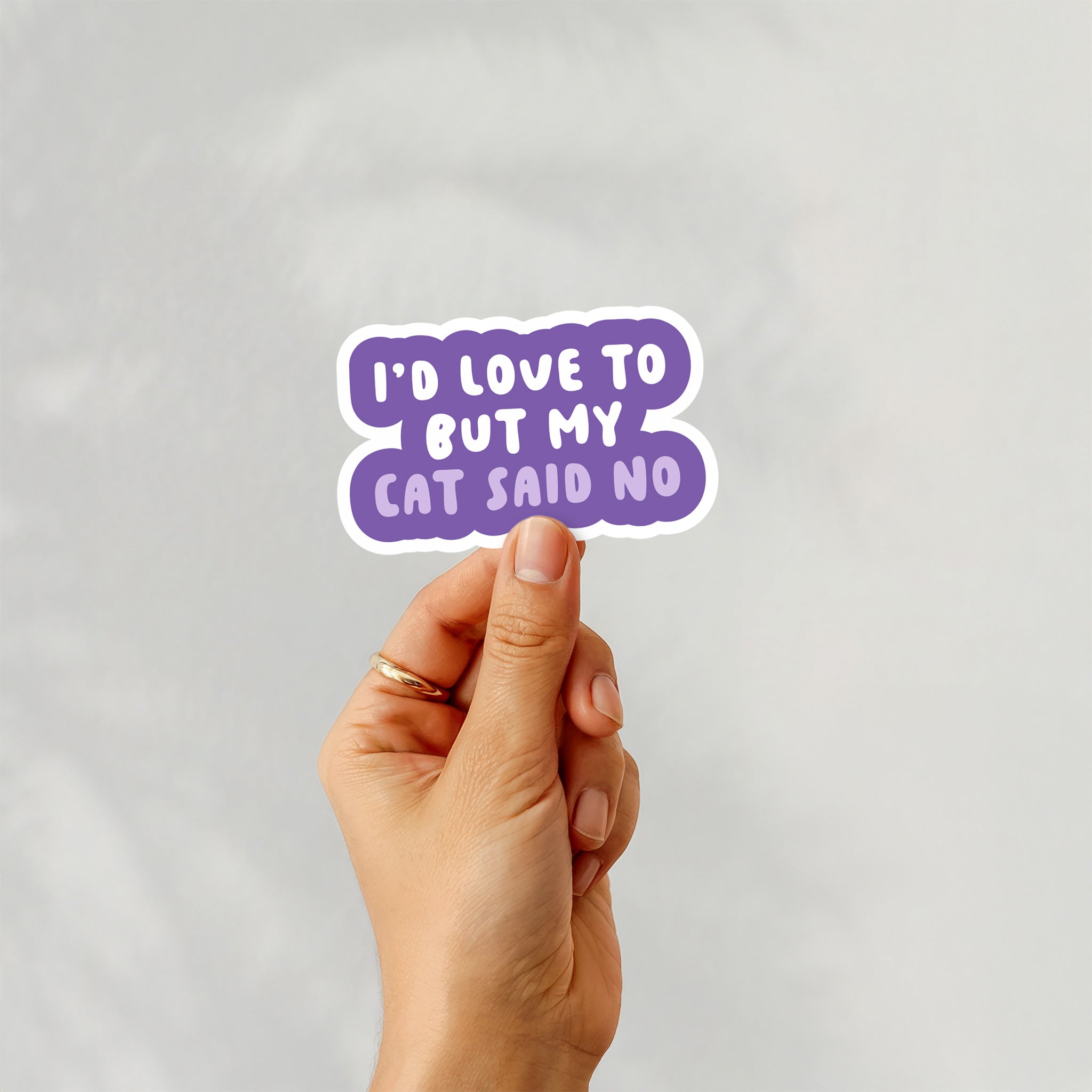 Vinyl sticker with phrase “I’d Love To But My Cat Said No” in bold purple typography – Funky Confetti