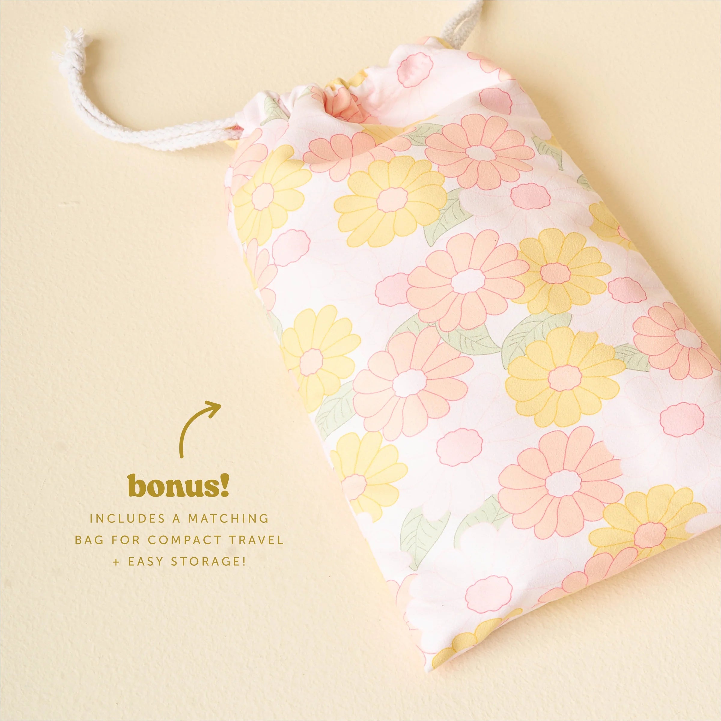 Daisy print XL quick-dry peach beach towel with yellow and pink floral pattern from Funky Confetti
