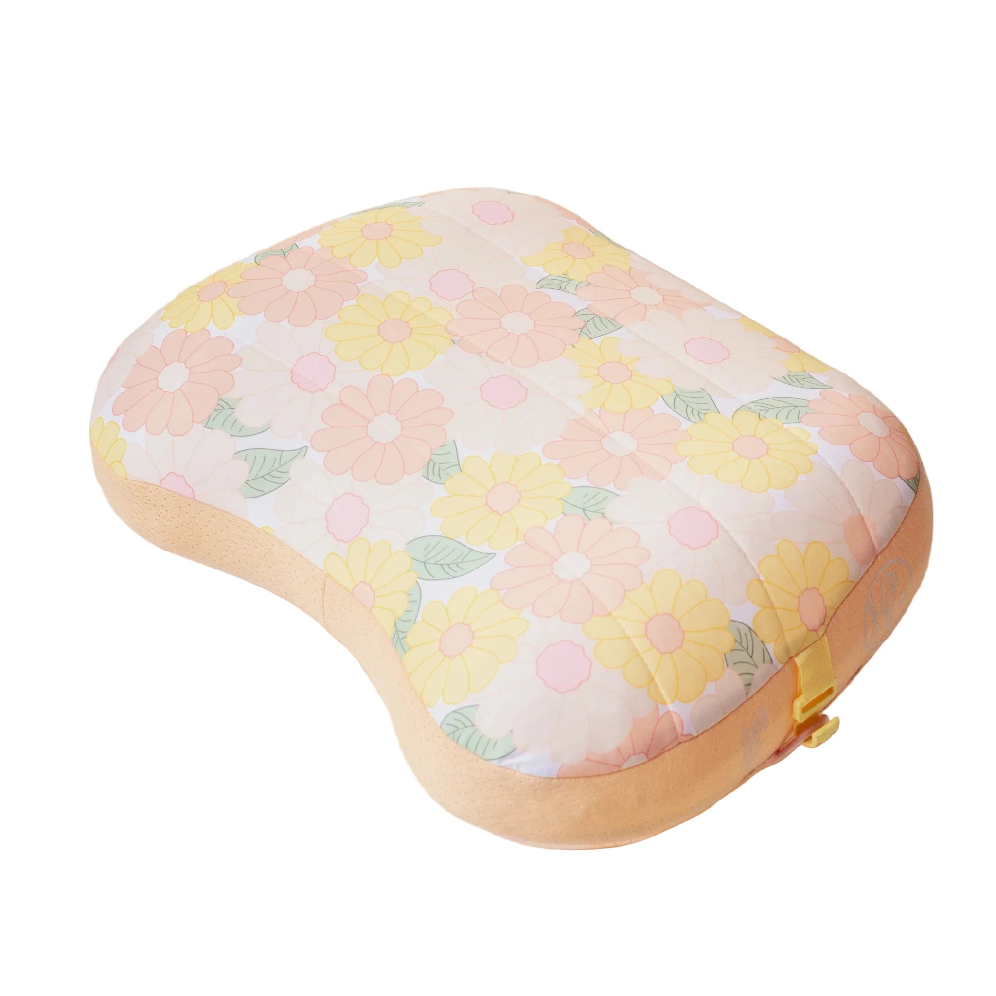 Peach daisy-patterned inflatable beach pillow with sand pocket for wind resistance from Funky Confetti