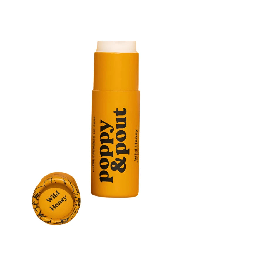 Eco-friendly paper-tube lip balm labeled “Wild Honey