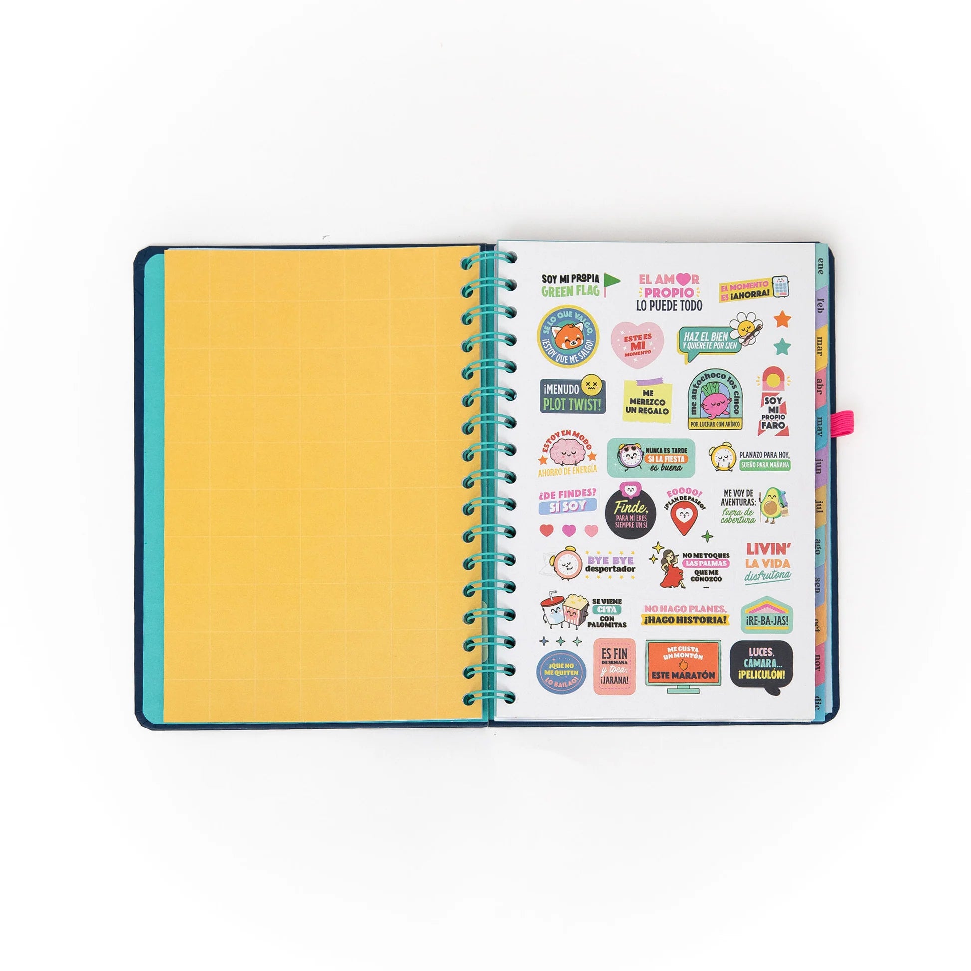 2026 weekly planner with navy cover, pink elastic band, and erasable pen from Funky Confetti