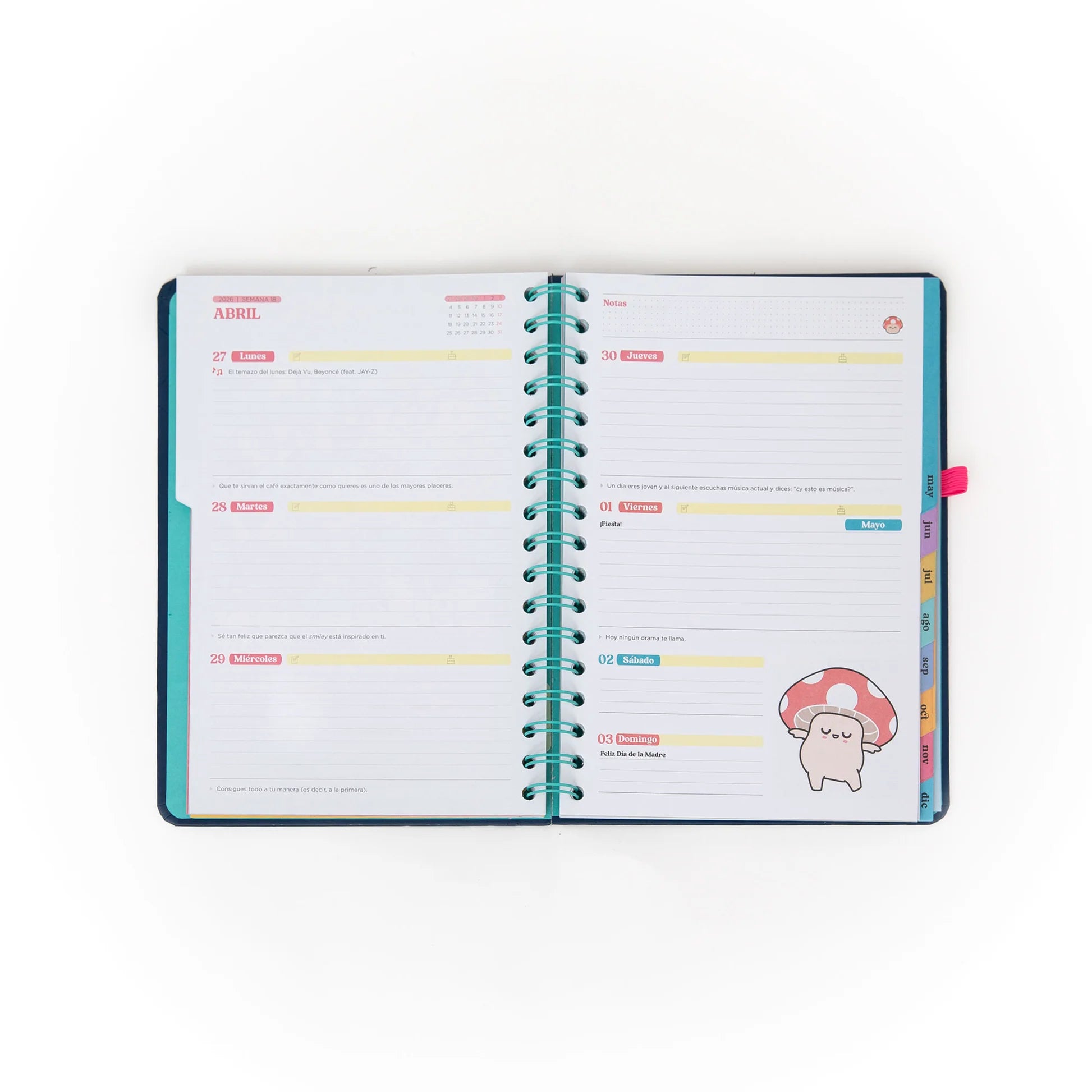 2026 weekly planner with navy cover, pink elastic band, and erasable pen from Funky Confetti