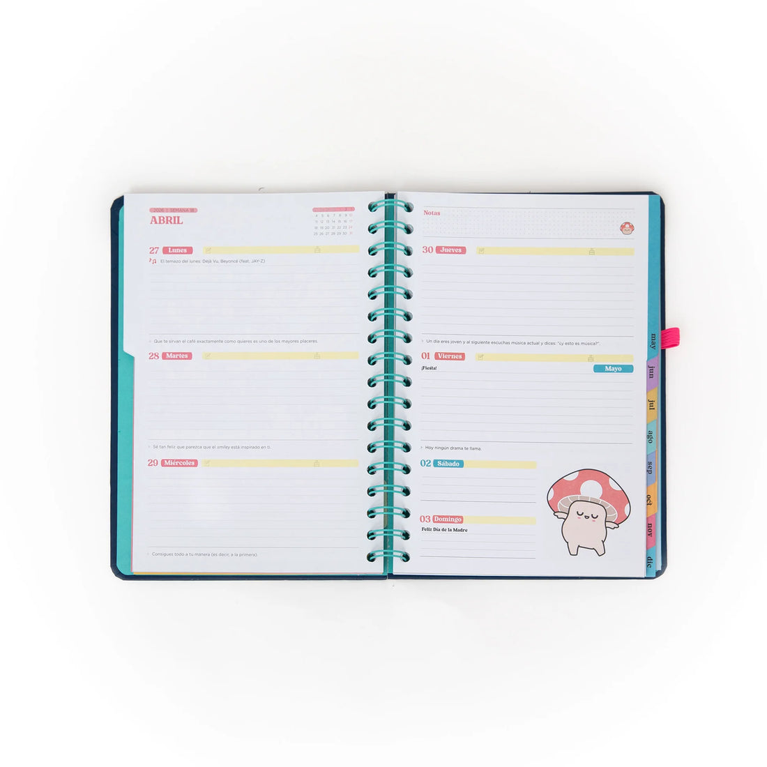 2026 weekly planner with navy cover, pink elastic band, and erasable pen from Funky Confetti