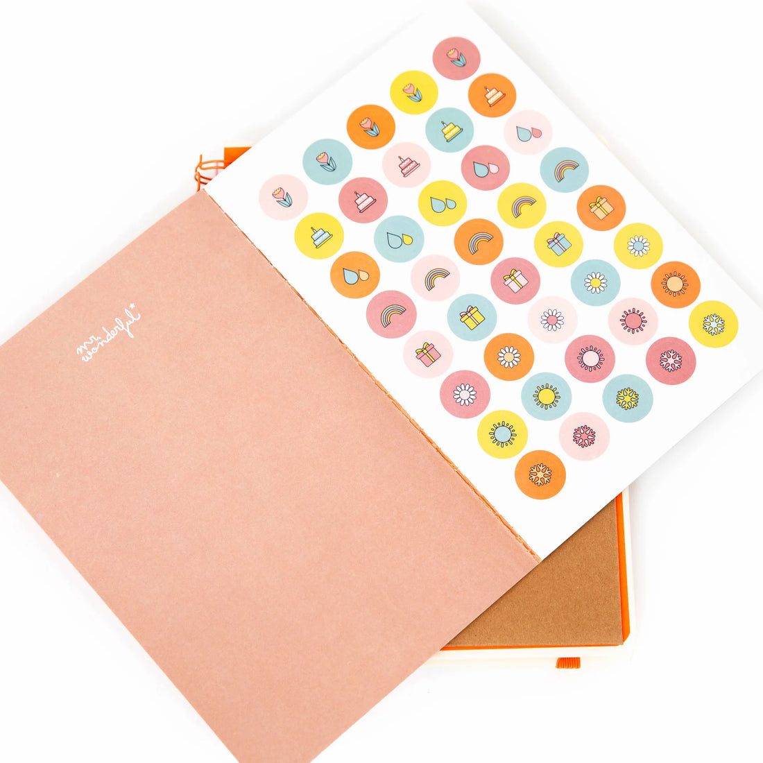 2026 weekly planner with cream cover, orange accents, and erasable pen from Funky Confetti