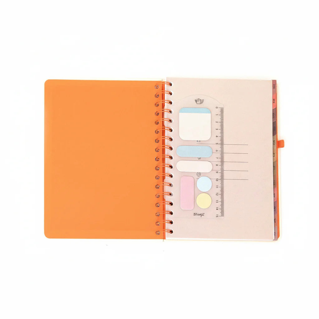 2026 weekly planner with cream cover, orange accents, and erasable pen from Funky Confetti