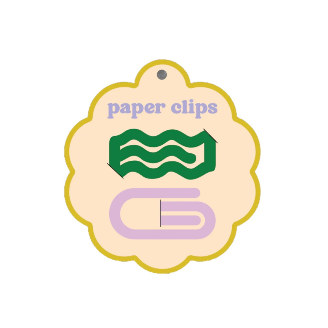 Green and purple decorative oversized paper clips for planners, journals, notebooks, and office organization by Funky Confetti.