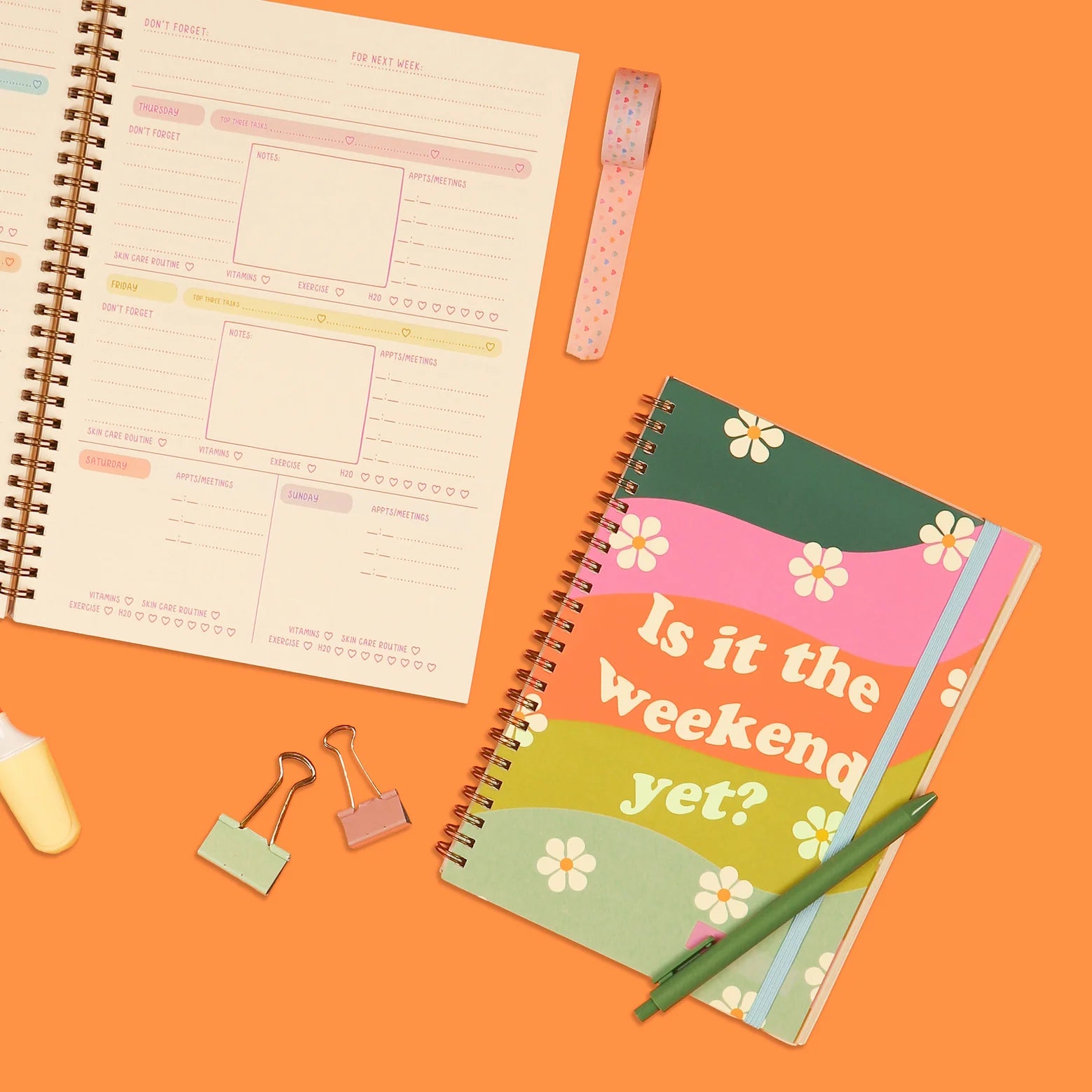 Is It The Weekend Yet? undated perpetual planner featuring a colorful rainbow cover, spiral binding, stickers, and flexible weekly and monthly planning layouts by Funky Confetti.