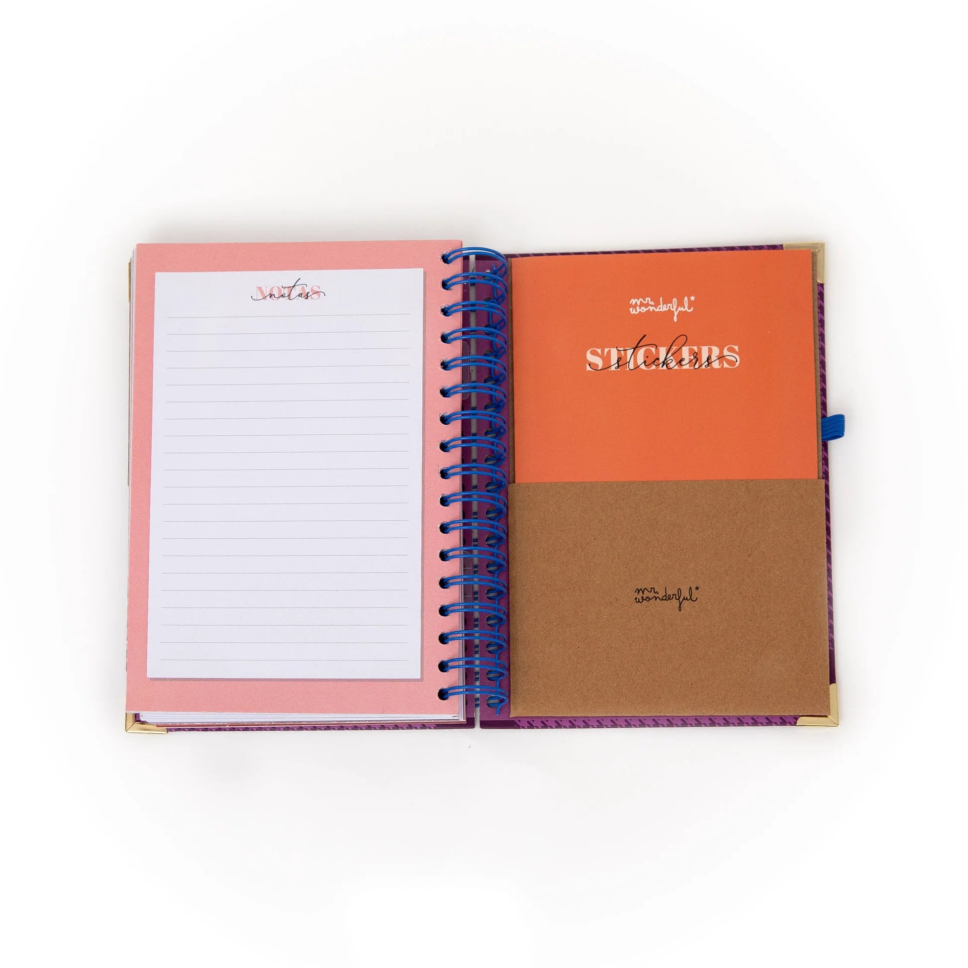 La Vida Es Hoy 2026 daily planner with purple cover, blue elastic band, and matching pen from Funky Confetti