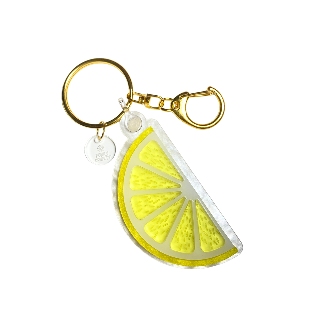 Yellow lemon slice acrylic keychain with glitter details and gold hardware from Funky Confetti