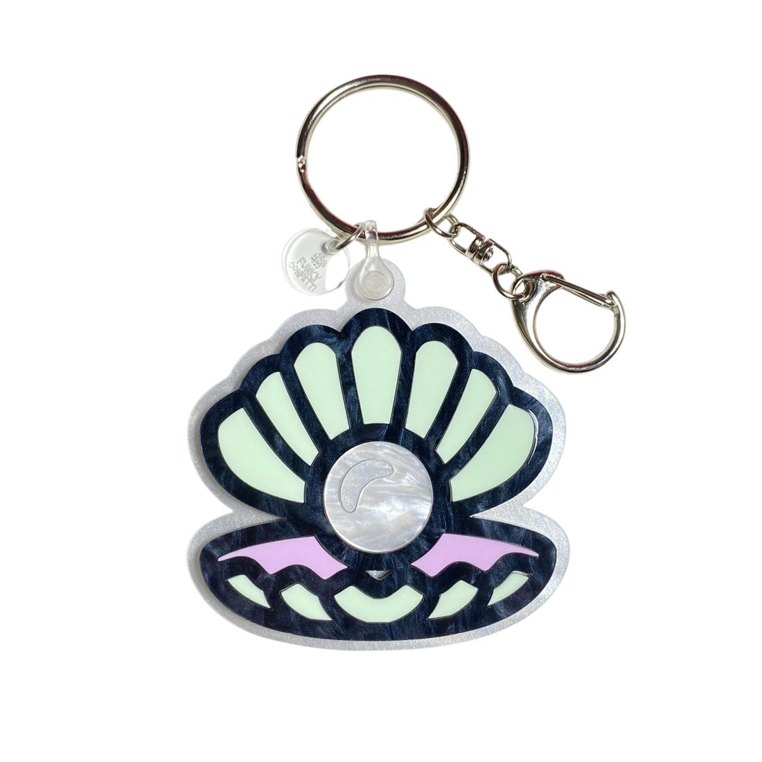 Seashell acrylic keychain with pearl-inspired center, pastel colors, and silver hardware from Funky Confetti
