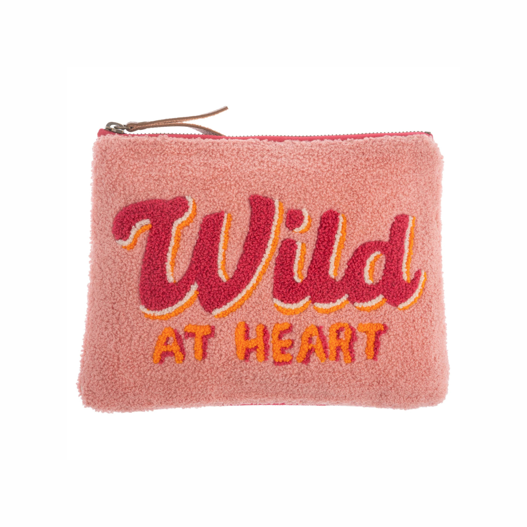 Pink embroidered carry all pouch with “Wild at Heart” text and leather zipper pull from Funky Confetti
