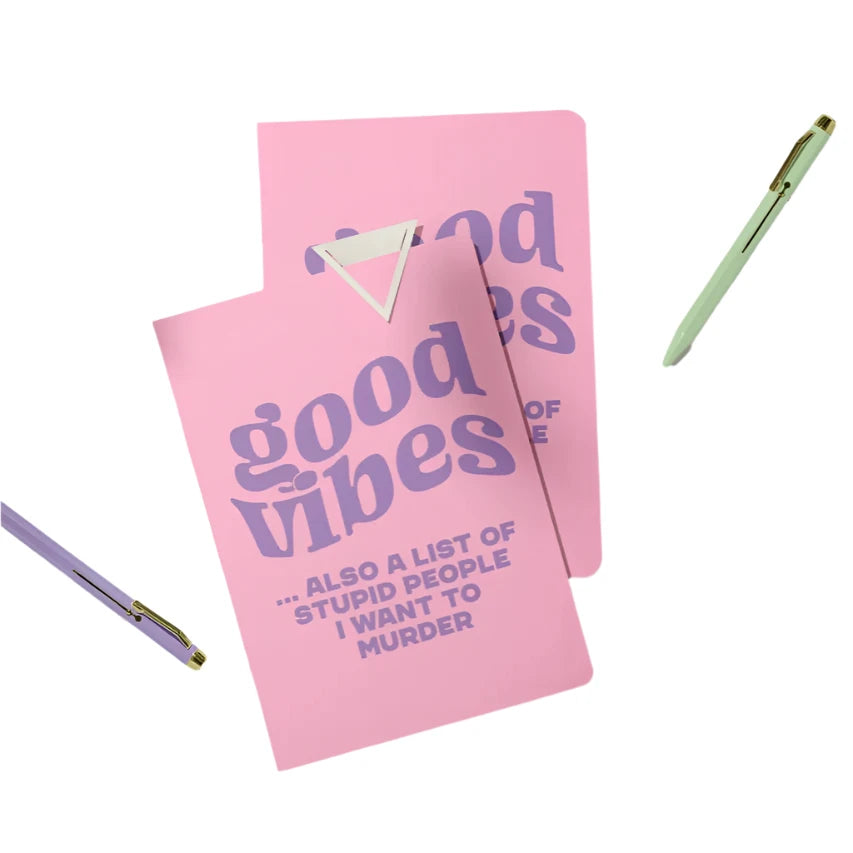 Pink pocket notebook with “Good vibes... also a list of stupid people” quote in bold purple text from Funky Confetti
