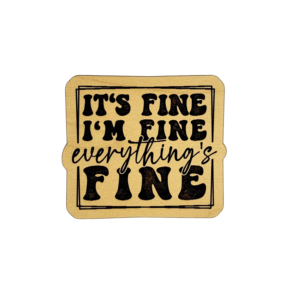 Rustic wood magnet with “It’s Fine I’m Fine Everything’s Fine” black text by Funky Confetti