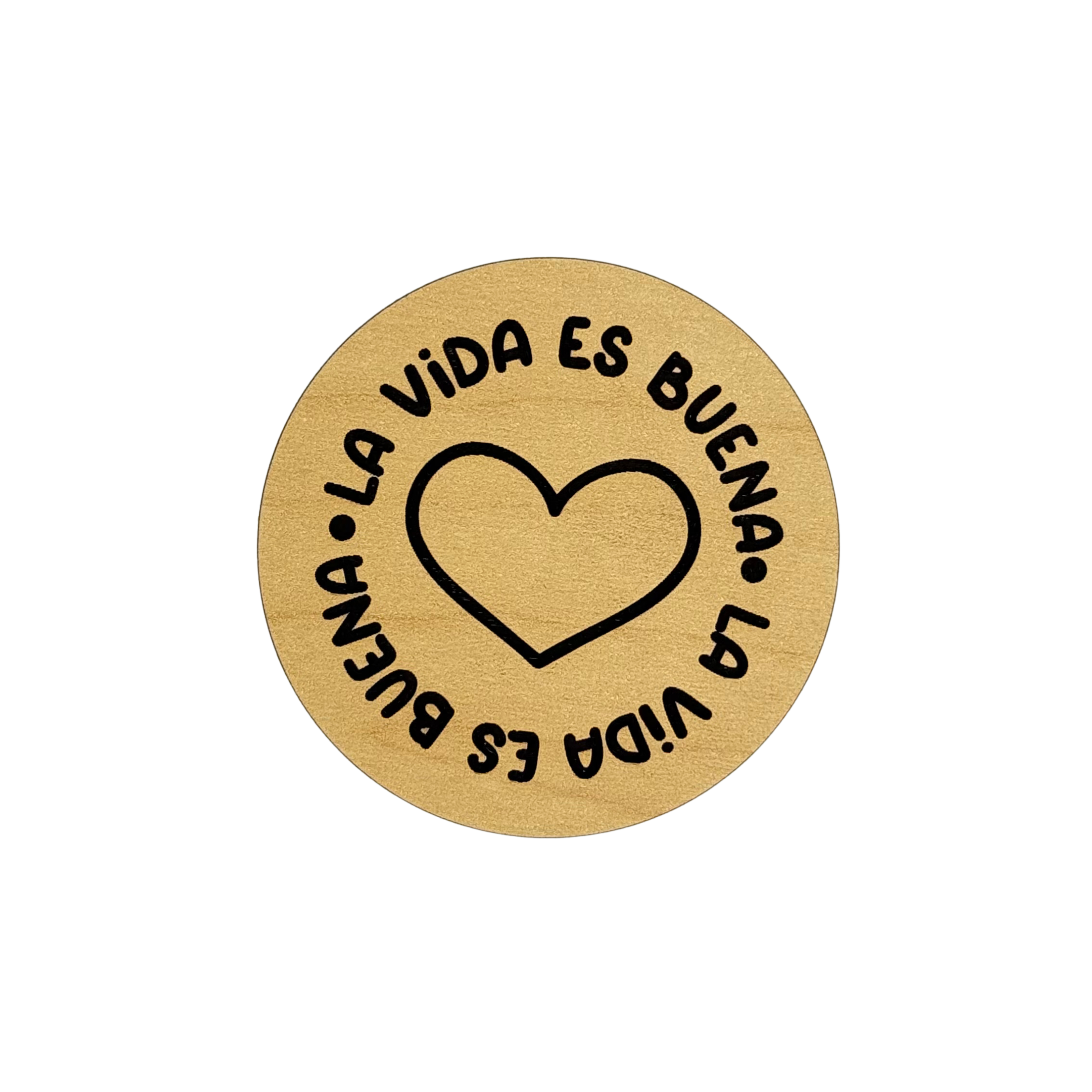 Round wood magnet with black heart and “La Vida es Buena” Spanish quote by Funky Confetti