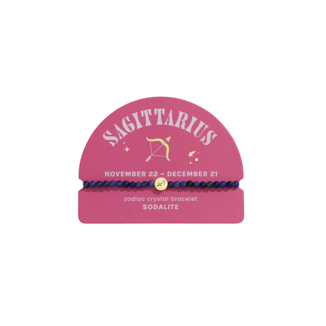 Sagittarius zodiac crystal bracelet with pink display box on white background