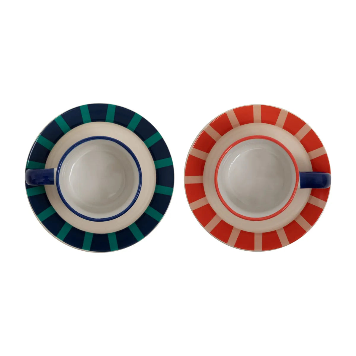 Top view of two saucers with radial stripes—left in blue/green, right in coral/red—with matching espresso cups.