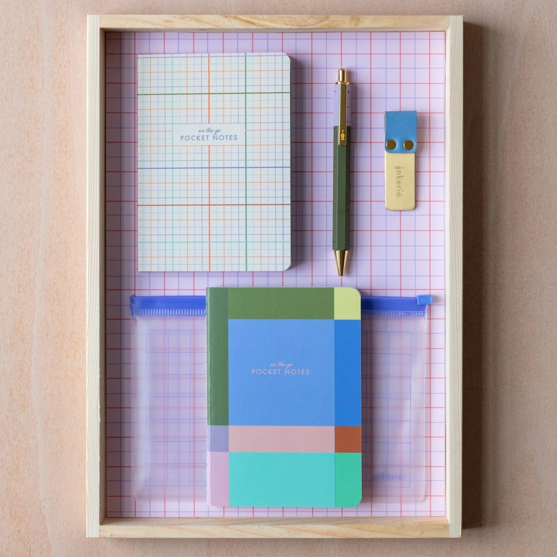 Compact stationery set with two colorful A6 notebooks, pen, clip, and reusable grid pouch – Funky Confetti