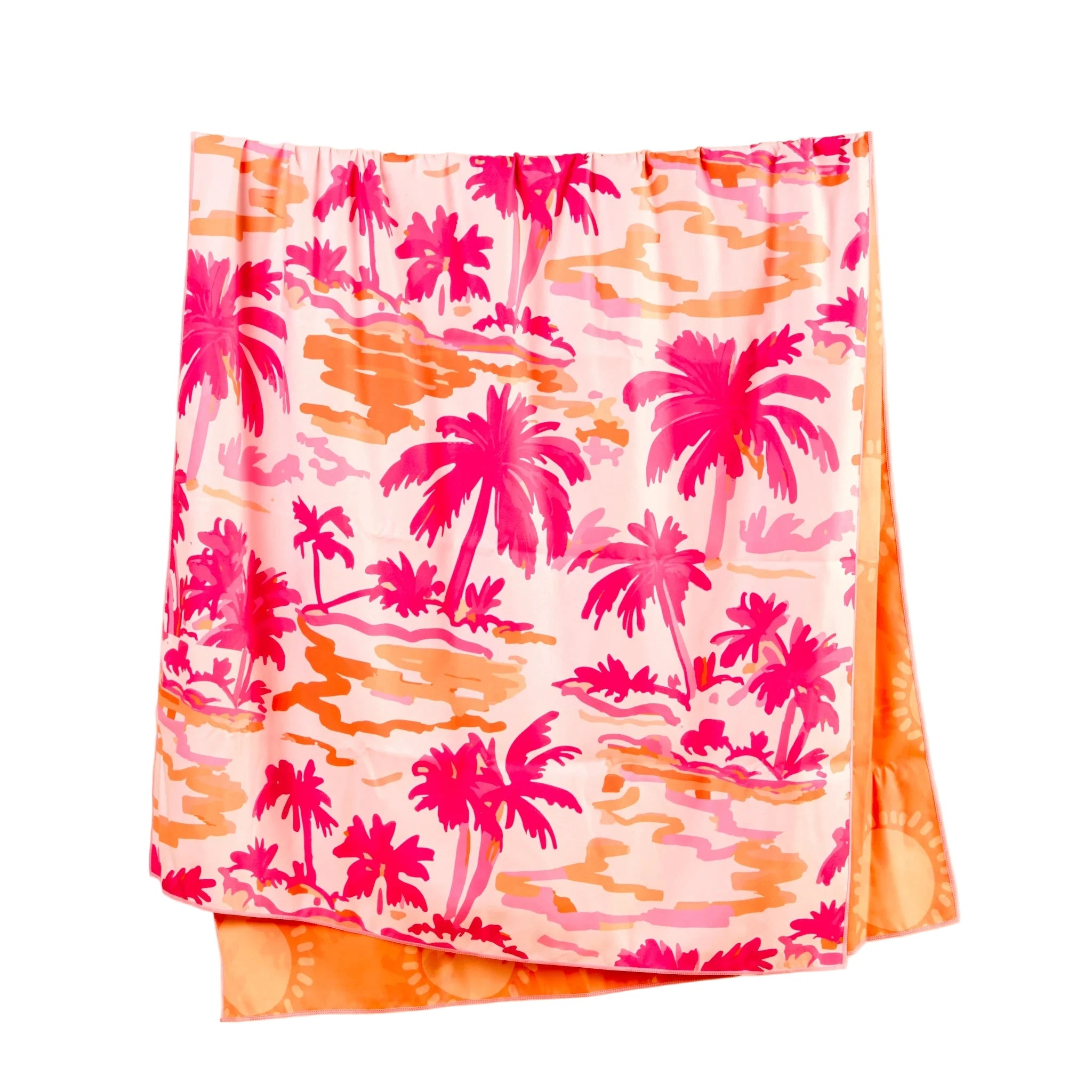 Tropical palm print XL quick-dry microfiber beach towel in pink and orange with matching drawstring bag from Funky Confetti