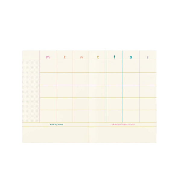 Perpetual Planner with colorful cover design and undated layouts from Funky Confetti