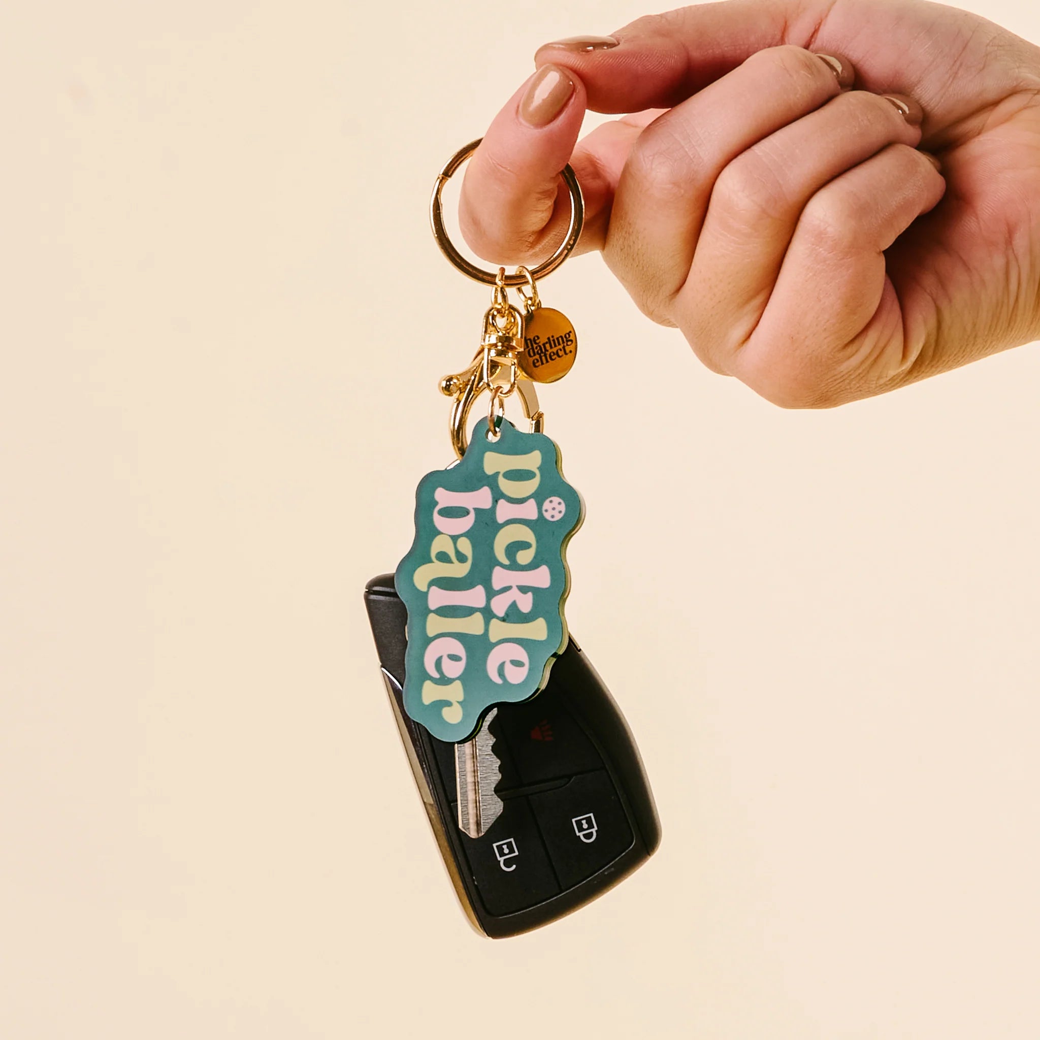Acrylic keychain with gold hardware and retro text that says “pickleballer” in pink and green – Funky Confetti