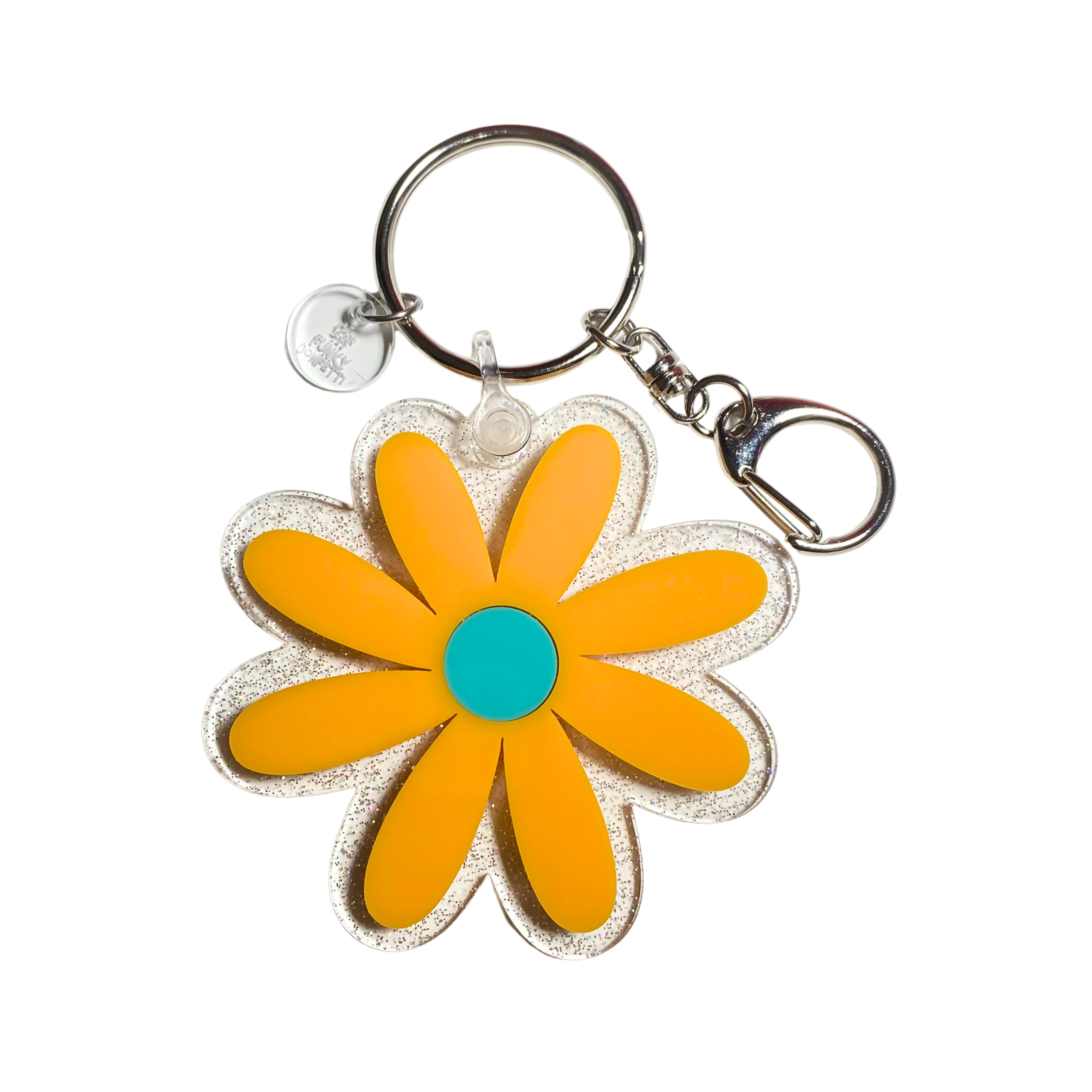 Colorful retro flower acrylic keychain with sparkly daisy charm available in pink, teal, and orange designs from Funky Confetti
