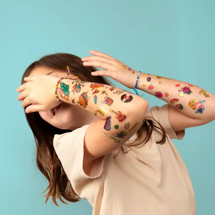 Temporary tattoos set with 50 colorful and gold designs, safe and easy to apply – Funky Confetti