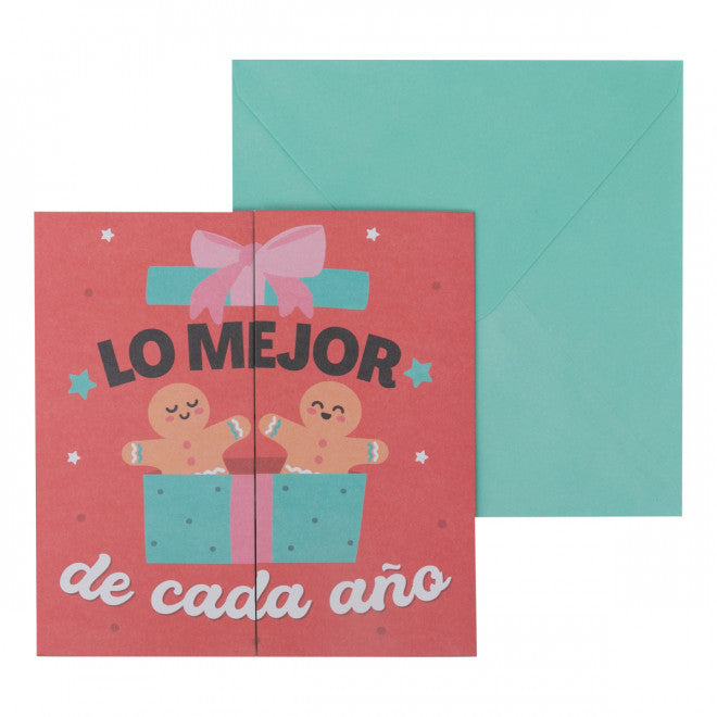 Christmas card with gingerbread characters and teal envelope reading “Lo Mejor de Cada Año”