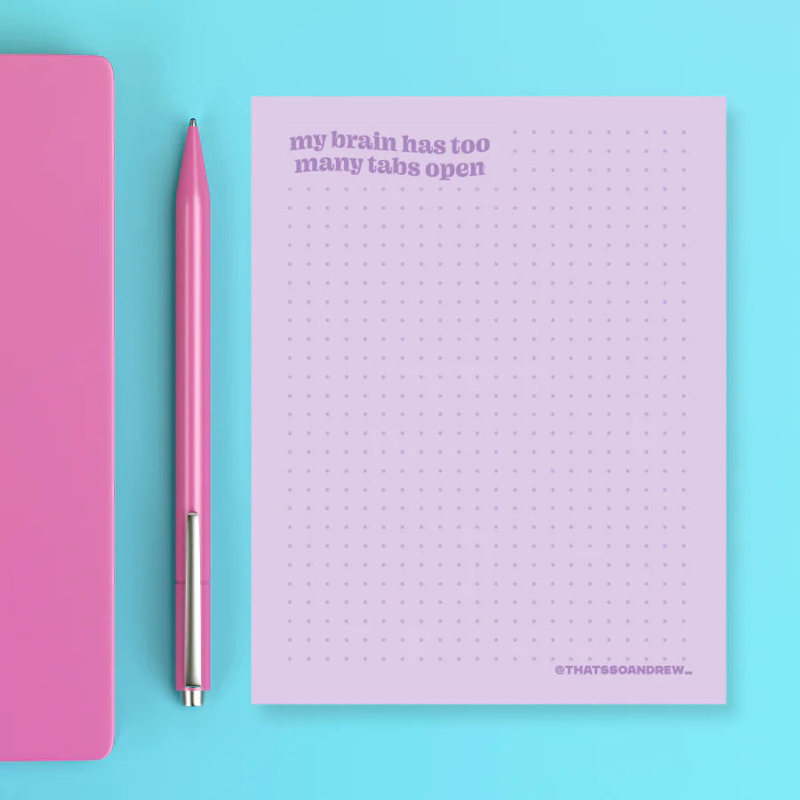Pastel purple notepad with dot grid and quote “my brain has too many tabs open” from Funky Confetti