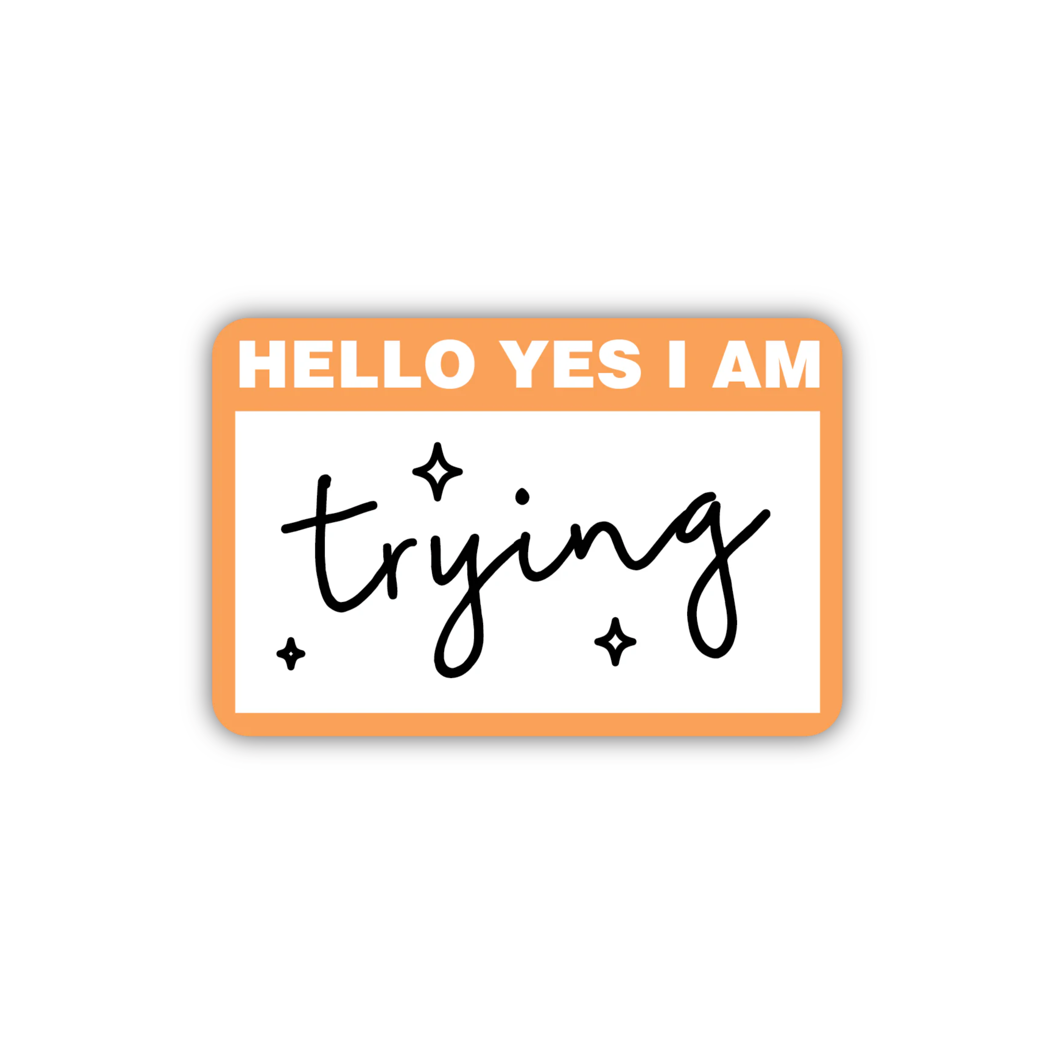 Orange-and-white name tag sticker that reads “HELLO YES I AM trying” with small sparkles.