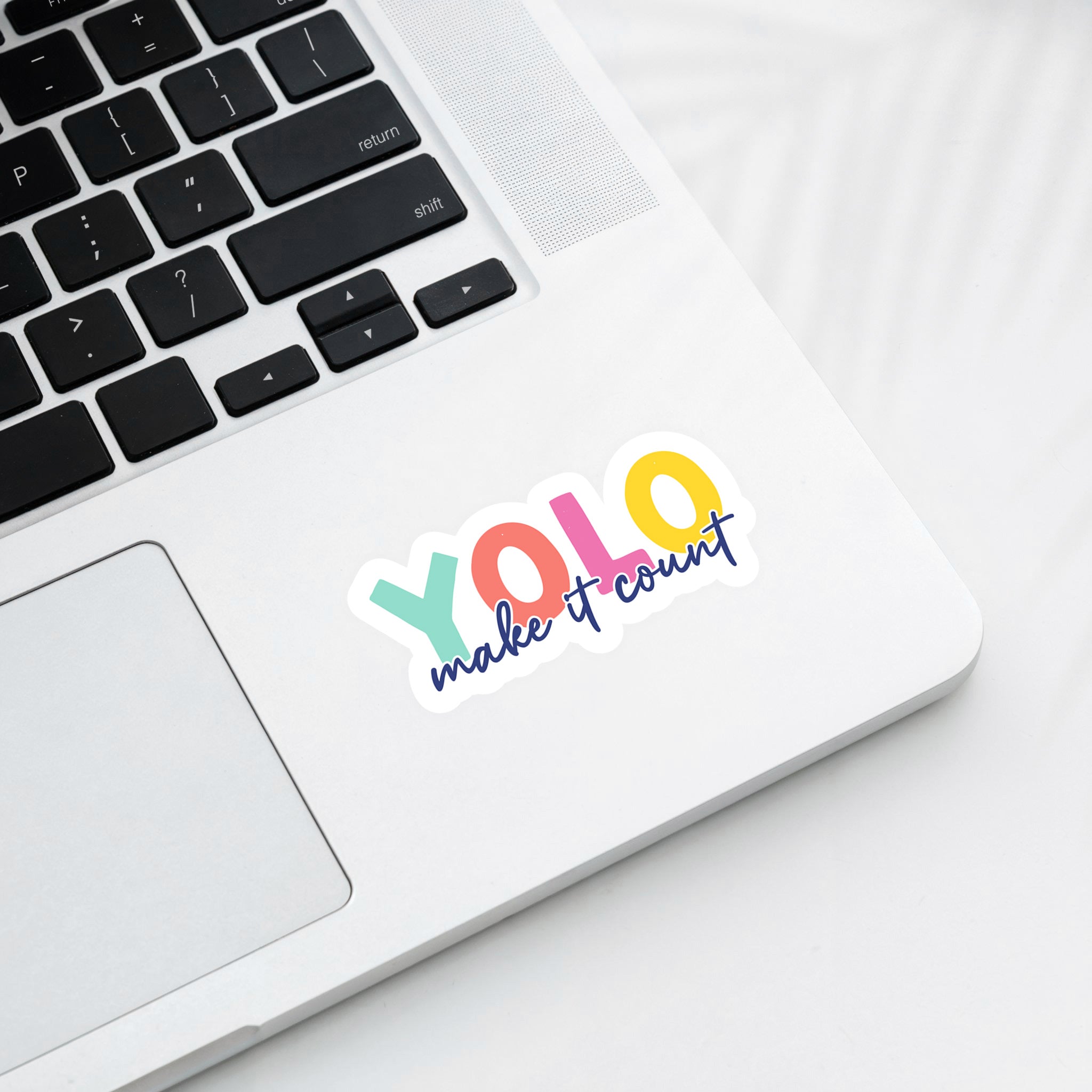 Colorful vinyl sticker with text “YOLO – Make It Count” in bold rainbow colors – Funky Confetti