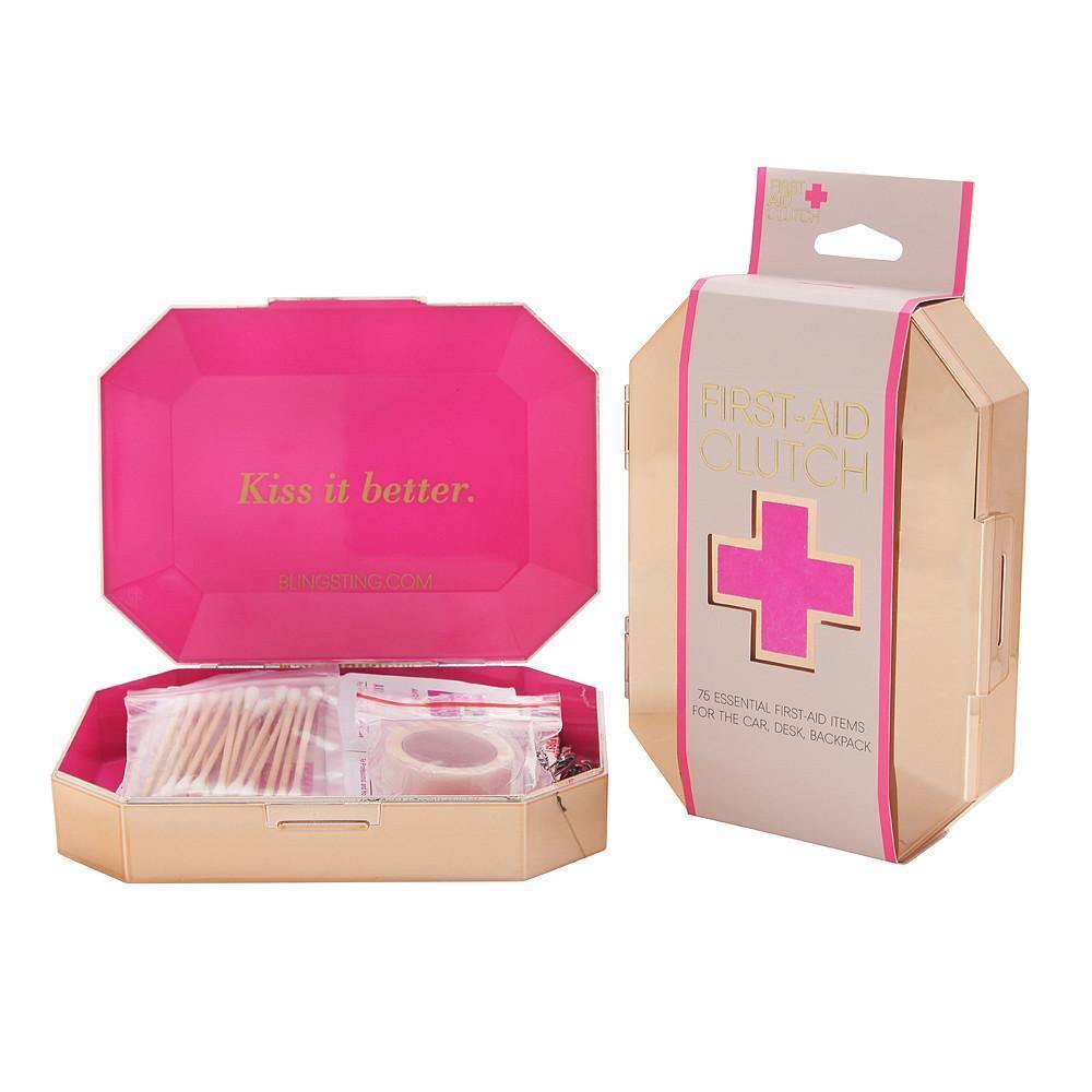 First-Aid Clutch in rose gold gemstone design with 75 essential first-aid items